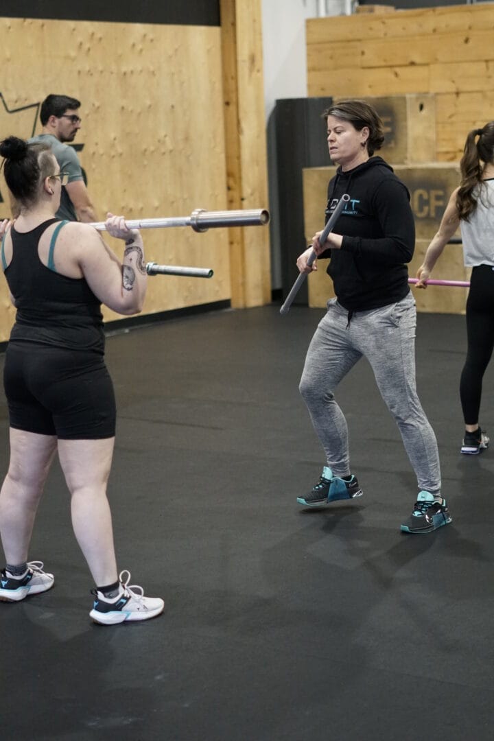 COach at Orleans CrossFit explaining a movement.